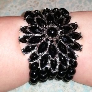 Black beaded bracelet with beautiful floral motif